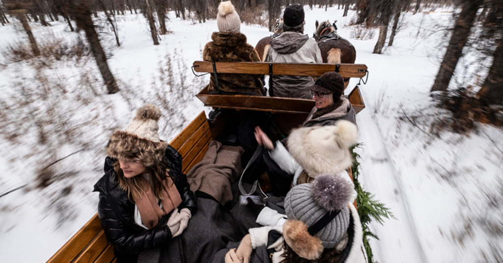 Guests Are Treated To A Vintage Sleigh Ride Through A Cottonwood Forest During The Winter Months In K